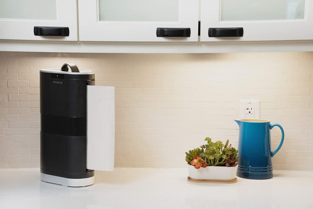 Automatic paper towel dispenser